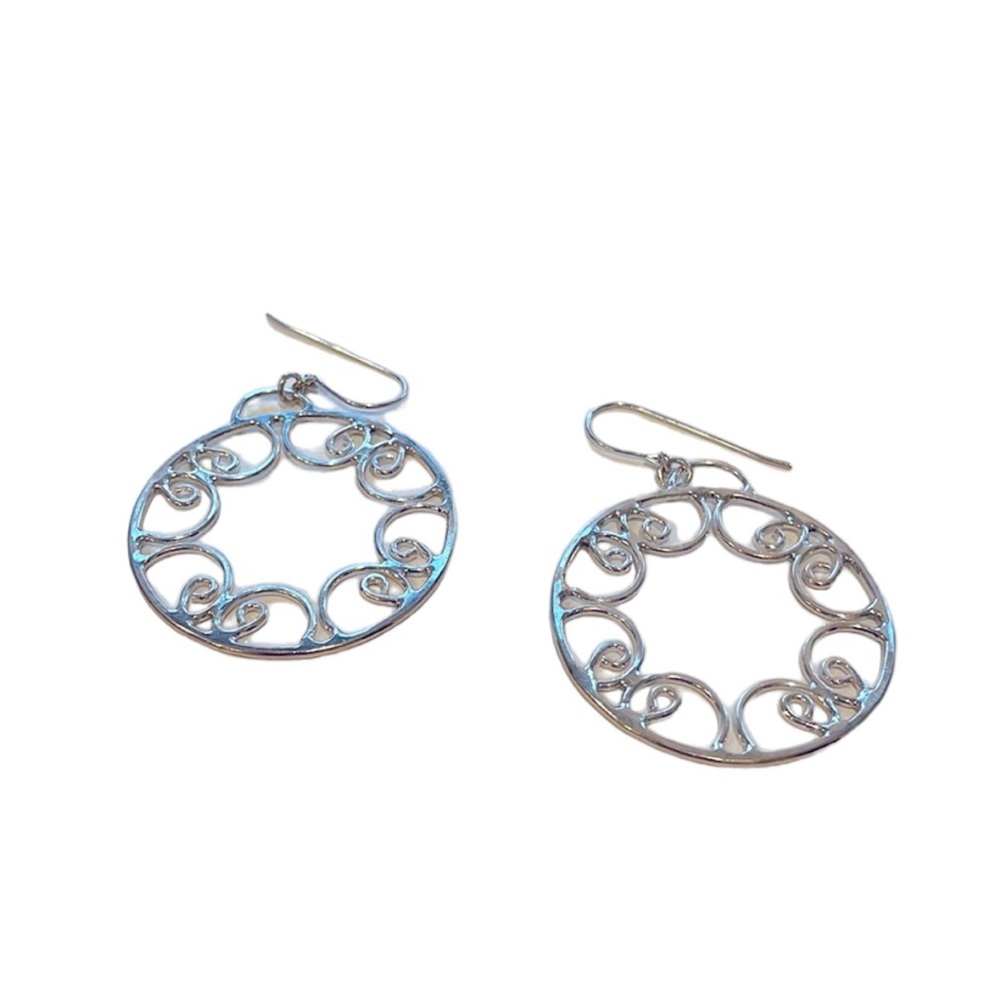 Beautiful silver circle filigree earrings with hook backs. EUC